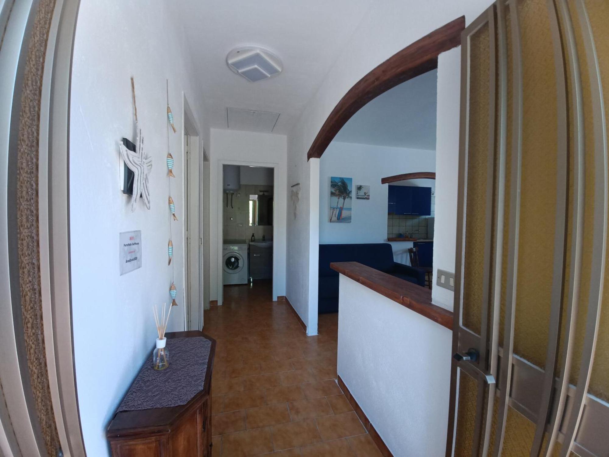 Portopollo Surfhouse Barrabisa Bagian luar foto